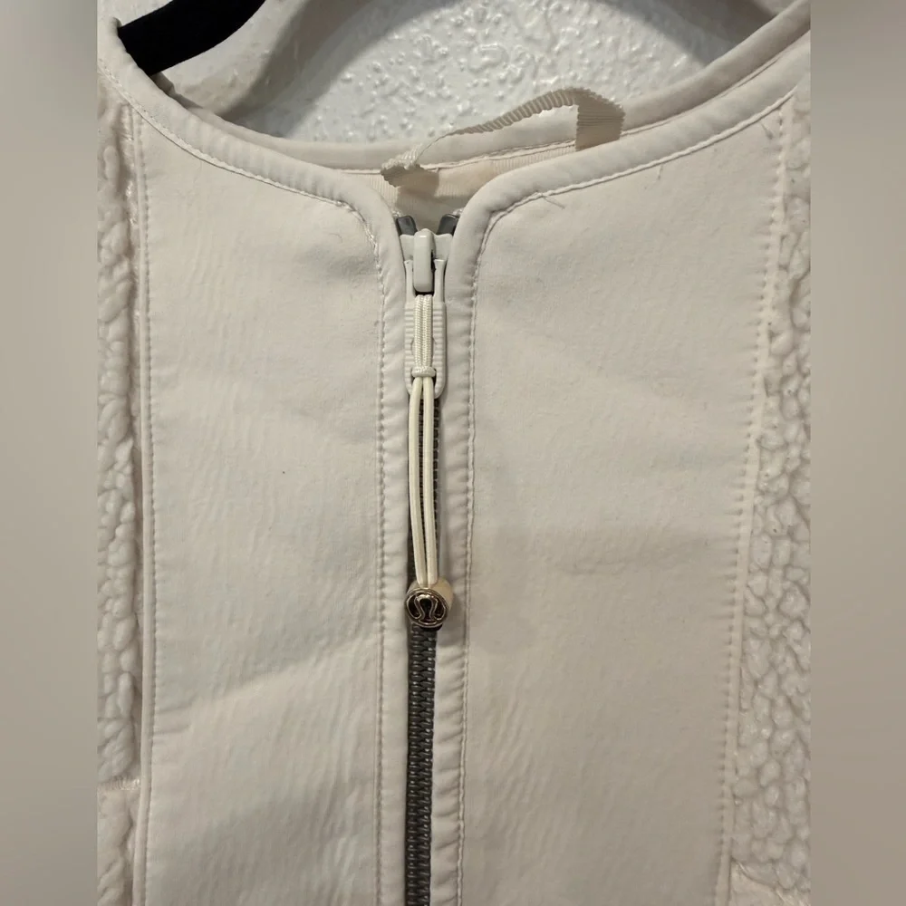 Lululemon Collarless Textured Fleece Full Zip jacket in the color White Opal